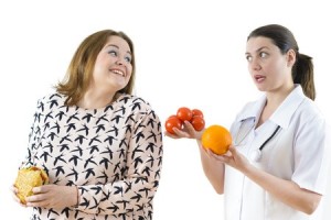 Doctor telling woman what to eat